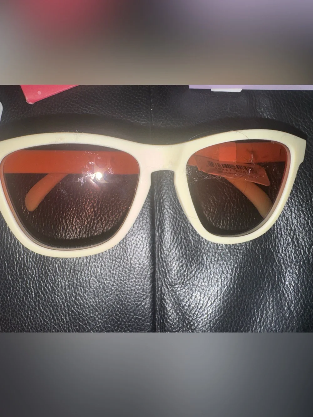 Cream Framed Sunglasses with Red-Tinted Lenses